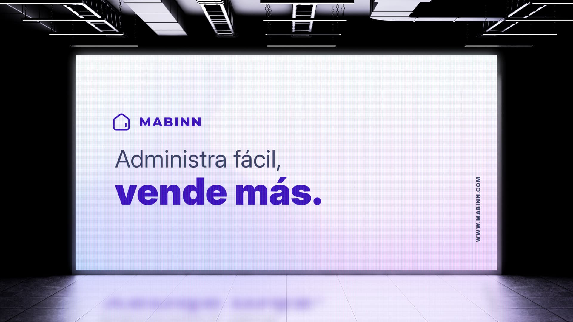 Pantalla luminosa de Mabinn con el mensaje «Administra fácil, vende más»