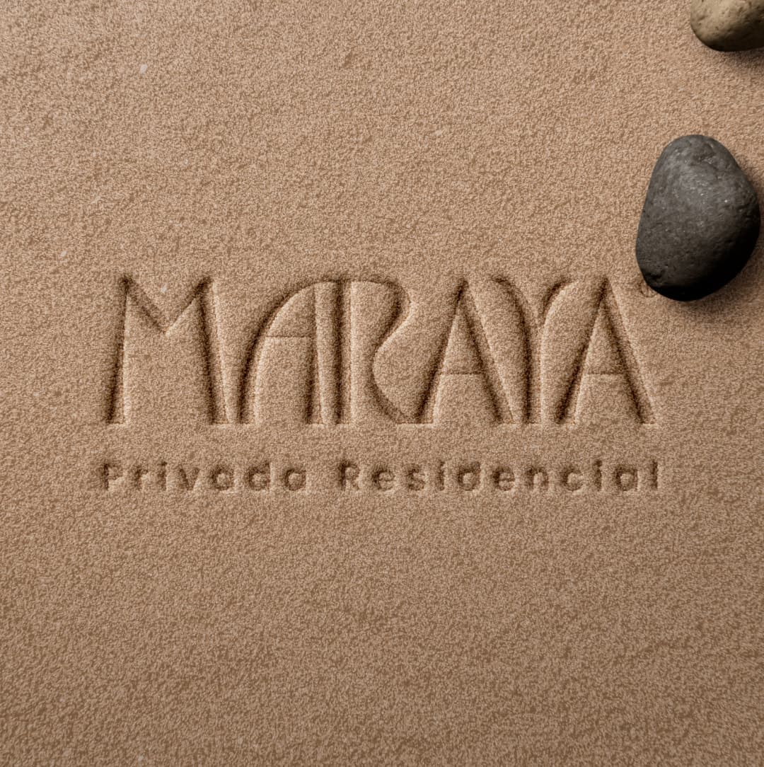 Maraya logo engraved in sand