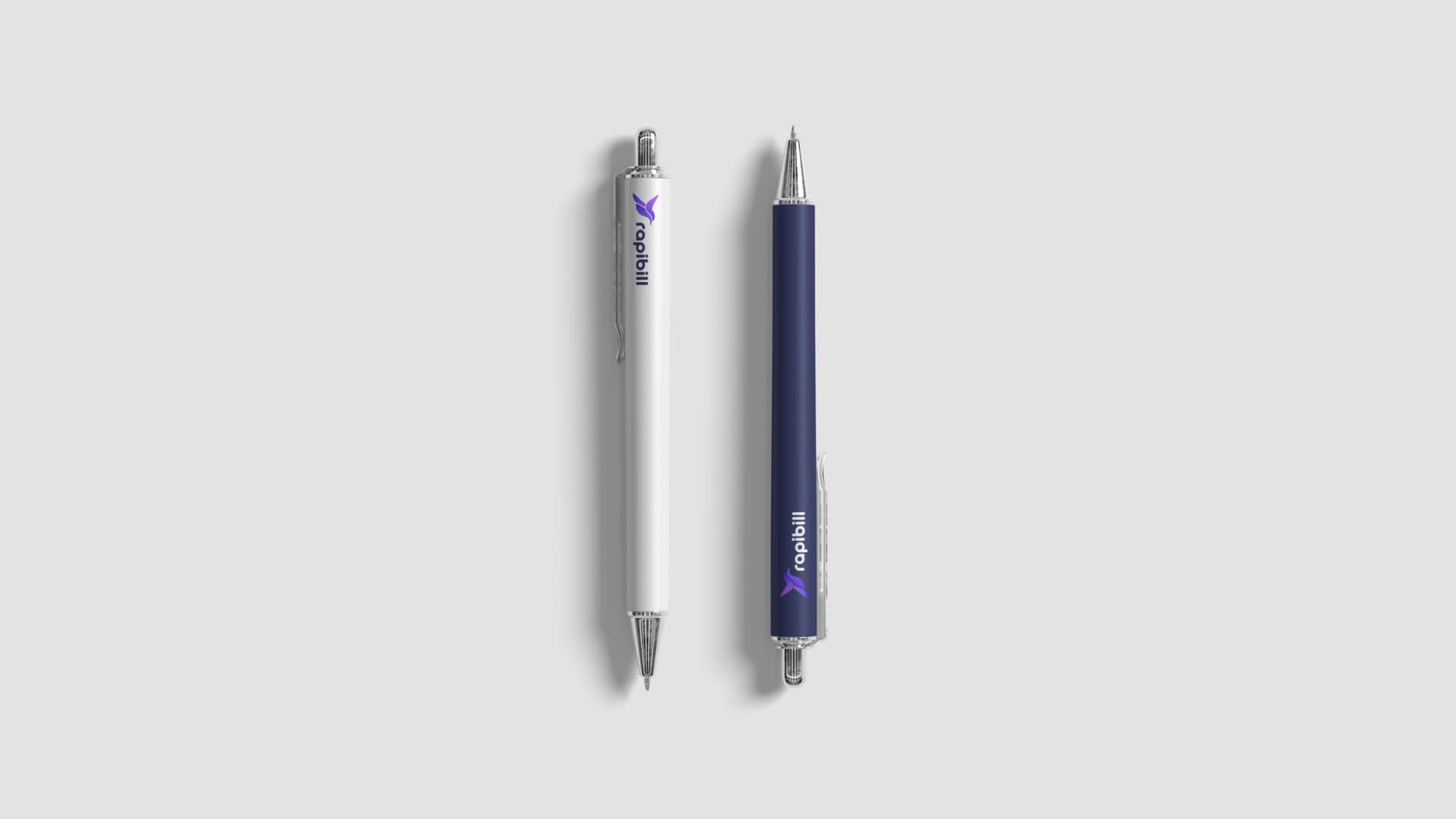 White and navy pens with the Rapibill logo
